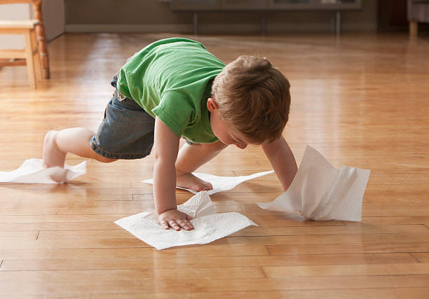 Kid cleaning floor